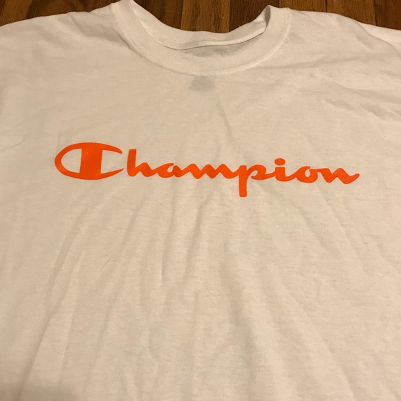 white and orange champion shirt